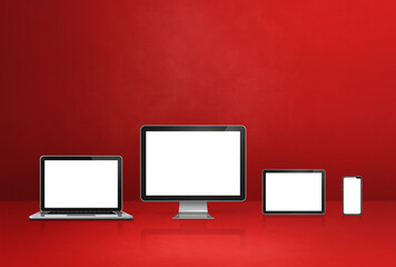 computer, laptop, mobile phone and digital tablet pc. red background