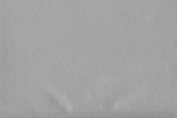 Cardboard black abstract texture close-up. Dark old paper background. Grunge concrete wall. Vintage blank wallpaper.