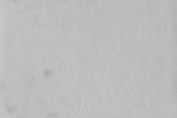 Cardboard black abstract texture close-up. Dark old paper background. Grunge concrete wall. Vintage blank wallpaper.