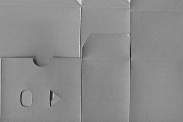 Cardboard black abstract texture close-up. Dark old paper background. Grunge concrete wall. Vintage blank wallpaper.