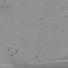 Cardboard black abstract texture close-up. Dark old paper background. Grunge concrete wall. Vintage blank wallpaper.