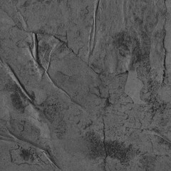 Cardboard black abstract texture close-up. Dark old paper background. Grunge concrete wall. Vintage blank wallpaper.