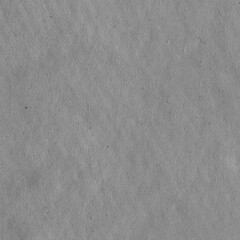 Cardboard black abstract texture close-up. Dark old paper background. Grunge concrete wall. Vintage blank wallpaper.