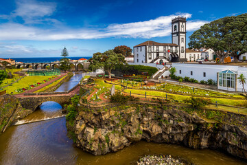 Fototapeta na wymiar Panoramic cityscape view to Municipality and central square Of Ribeira Grande, Sao Miguel, Azores, Portugal. Central square of Ribeira Grande, Sao Miguel, Azores, Portugal.