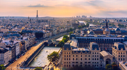 Fototapeta na wymiar Panoramic aerial view of Paris, Eiffel Tower and La Defense business district. Aerial view of Paris at sunset. Panoramic view of Paris skyline with Eiffel Tower and La Defense. Paris, France.