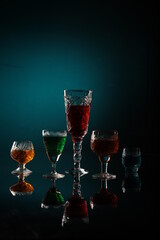 Colorful drinks in crystal glasses
