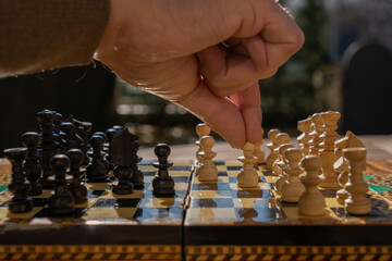 Man playing chess game in the morning