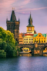 Fotobehang Charles Bridge in Prague in Czechia. Prague, Czech Republic. Charles Bridge (Karluv Most) and Old Town Tower. Vltava River and Charles Bridge. Concept of world travel, sightseeing and tourism. © daliu