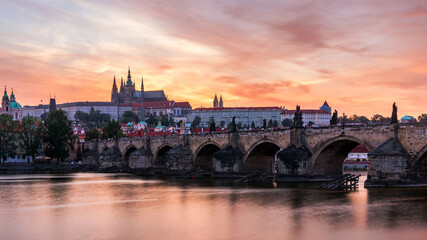 Fototapeta na wymiar Charles Bridge at sunset with colorful sky, Prague, Czech Republic. Prague old town and iconic Charles bridge and Castle, Czech Republic. Charles Bridge (Karluv Most), Old Town Tower and Castle.