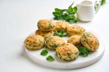 Homemade buns with fresh herbs and cheese. Top view with copy