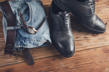 jeans with shoes and watch