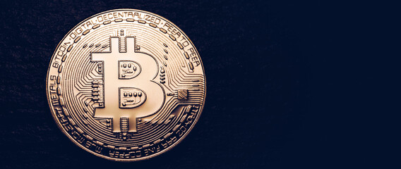 Crypto currency golden coin with bitcoin symbol on isolated on black background. Bitcoin Coin on black background. Bitcoin cryptocurrency.  Cryptocurrency Coin Concept.