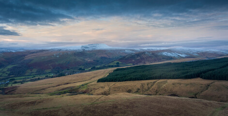 The summit of Fan Hir dusted in snow, a peak at the eastern end of the Black Mountain in the Brecon Beacons National Park, South Wales UK