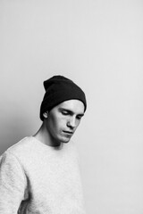 portrait of a young guy, looking down