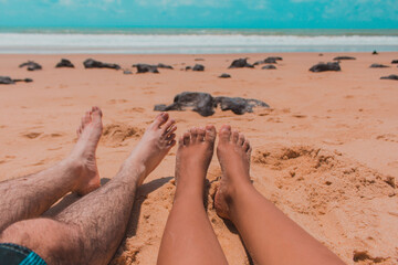 feet on the beach