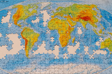 Fototapeta na wymiar Puzzle of map of the world.