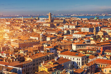 Venice panoramic aerial view with red roofs, Veneto, Italy. Aerial view with dense medieval red roofs of Venice, Italy