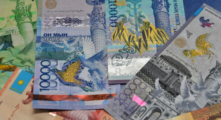 some tenge banknotes from the country of kazakhstan