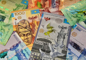 some tenge banknotes from the country of kazakhstan