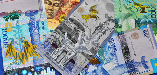 some tenge banknotes from the country of kazakhstan