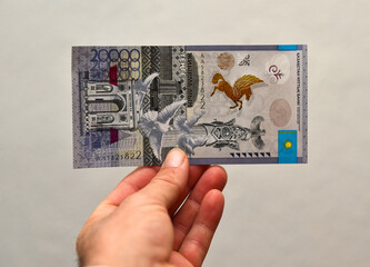 some tenge banknotes from the country of kazakhstan