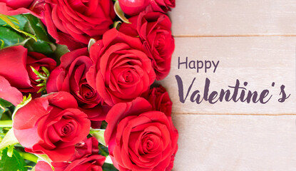 dark red roses on table