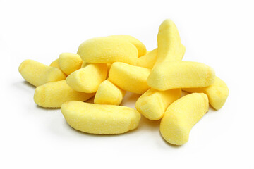 Group of foam banana sweets isolated on white background. Candies for kids