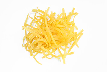 Pile of raw uncooked noodles isolated on white background