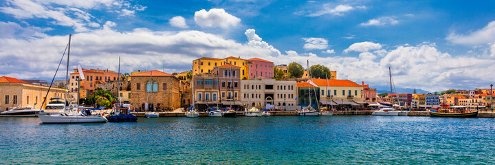 Fototapeta na wymiar Picturesque old port of Chania. Landmarks of Crete island. Greece. Bay of Chania at sunny summer day, Crete Greece. View of the old port of Chania, Crete, Greece. The port of chania, or Hania.