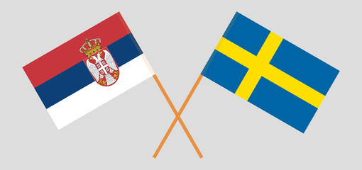 Crossed flags of Serbia and Sweden