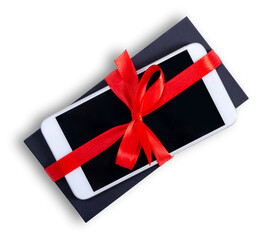 gift box with red ribbon smartphone mobile phone on white background, top view