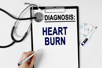 On the table are a stethoscope, a pill thermometer, and a diagnosis sheet. The text is written on...
