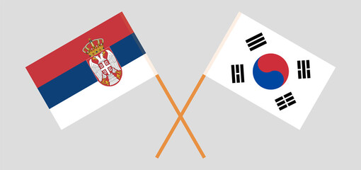 Crossed flags of Serbia and South Korea