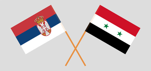 Crossed flags of Serbia and Syria