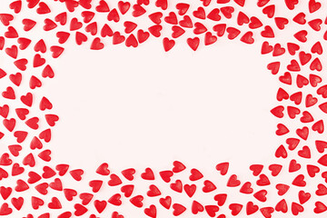 Uneven frame of Heart shaped red sprinkles pattern background banner, festive love gift and Valentine's Day concept. banner mockup. Small hearts