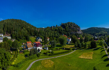 Naklejka premium Panoramic view of Mount Oybin and the ruins of the monastery church and the castle, Germany. Drone photography