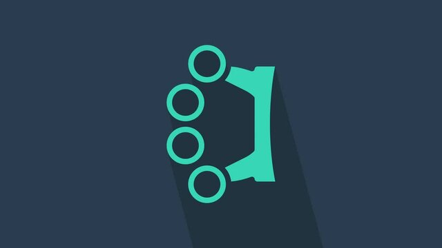 Turquoise Brass knuckles icon isolated on blue background. 4K Video motion graphic animation.