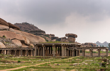 Hampi, Karnataka, India - November 5, 2013: Sri Krishna tank in ruins. Remains of hall with...