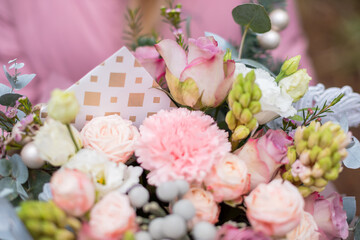 A flower bouquet with an envelope for Valentine's Day