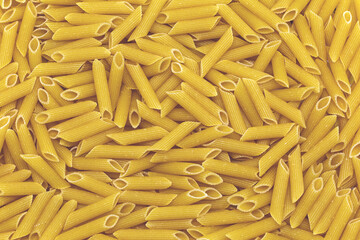 Penne italian pasta as background