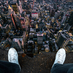 Surreal Imagination Photography of a Man Standing in a Puddle of an Aerial view of a City Skyline