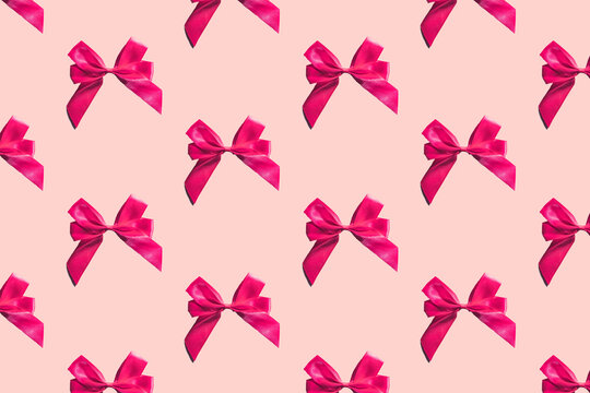 Pink Bows Pattern On Pink Background. Gift Wrapping