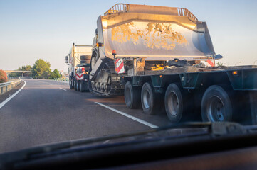 Heavy-duty truck carrying bulldozer