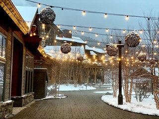 Empty Stowe Mountain resort Spruce peak village at evening time early December 2020 Vermont, USA