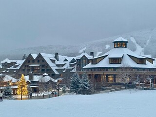 Empty Stowe Mountain resort Spruce peak village at evening time early December 2020 Vermont, USA