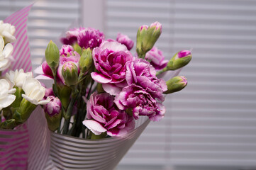 bouquets of white and pink flowers on a gray background blinds.mother's day, valentine's day, knowledge day, women's day