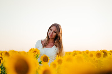 woman in a field of sunflowers