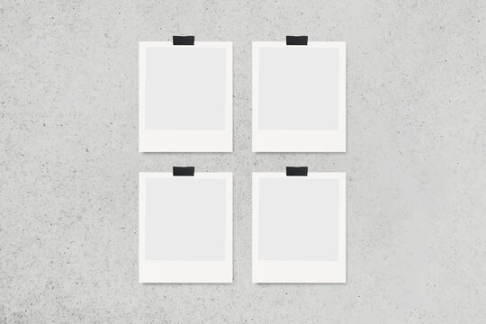 set of four polaroid photo mockup hang on grey wall with tape