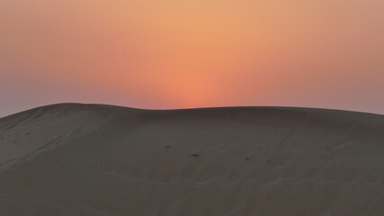 Fototapeta na wymiar After Sunset In The Arabian Desert, Emirate Of Dubai, United Arab Emirates