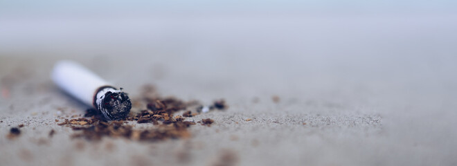 Cigarette Butt on the floor with copy space background